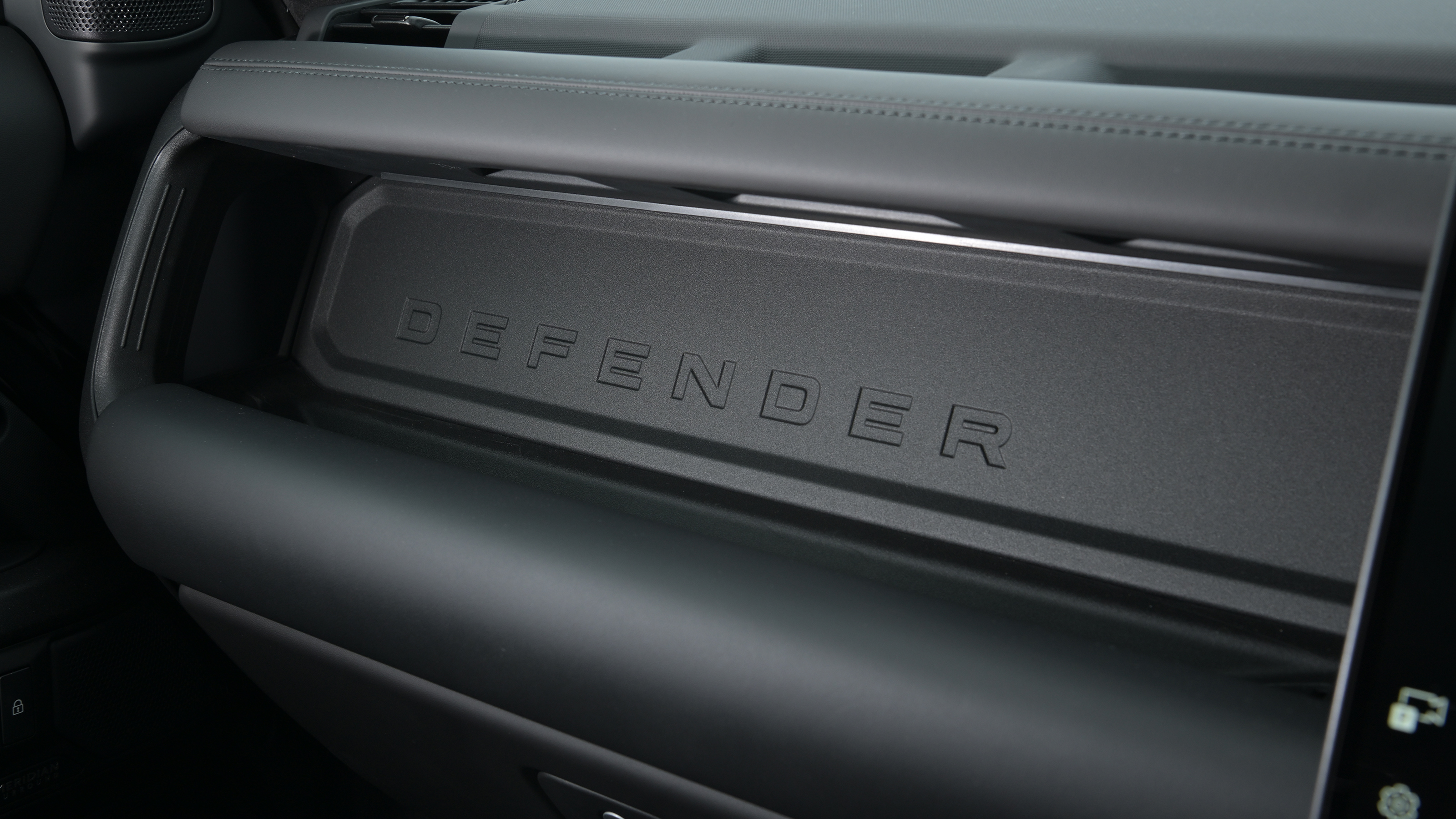 Land Rover Defender OCTA Black - passenger-side dashboard