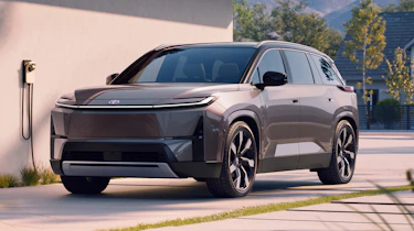 Toyota Highlander BEV - front 3/4 charging