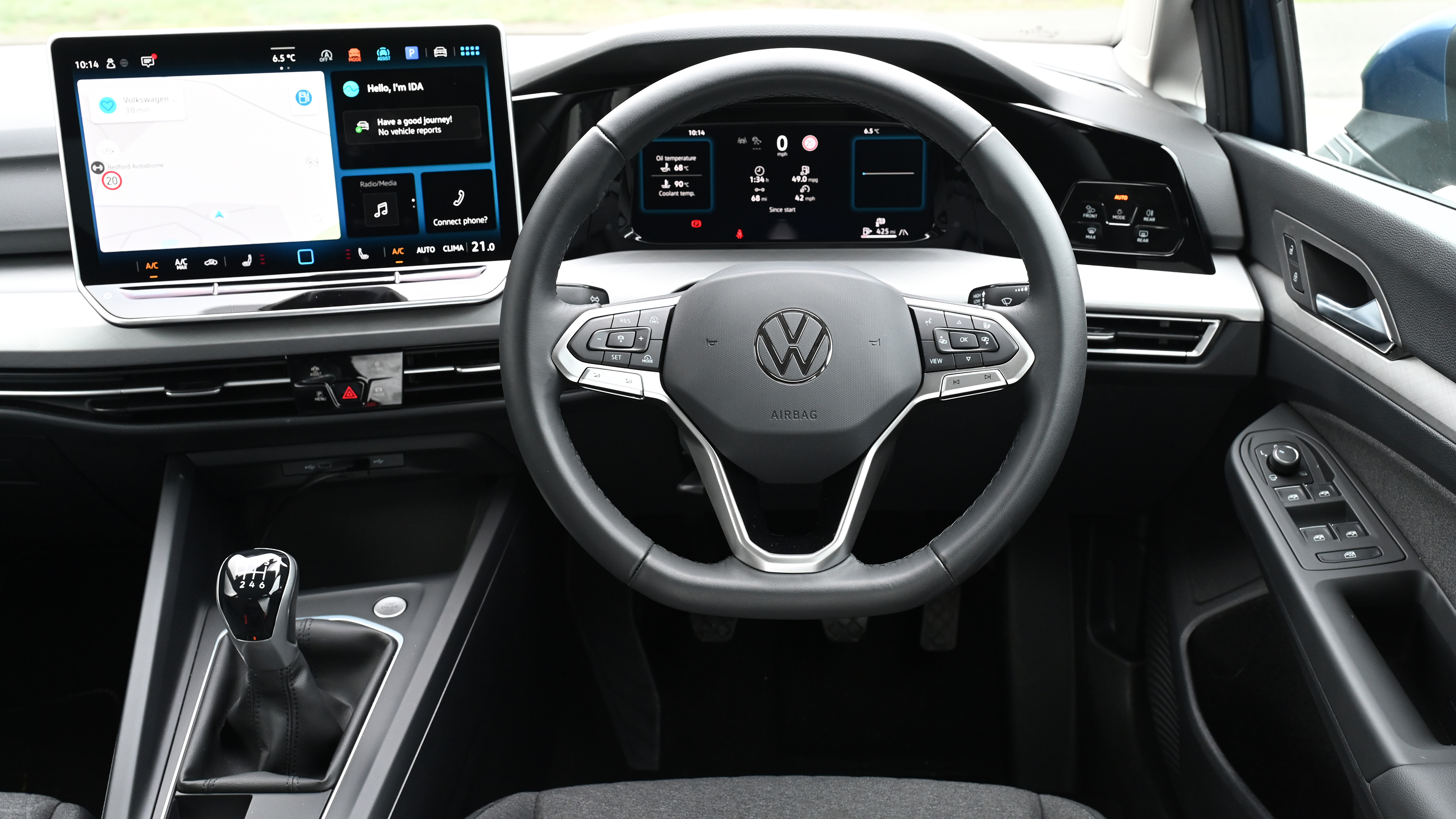 Volkswagen Golf - steering wheel and dashboard