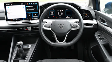 Volkswagen Golf - steering wheel and dashboard