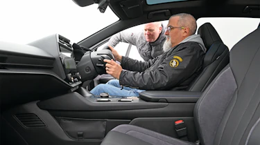 Lexus RZ550e - Dean in front seat