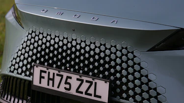 Omoda 7 - grille