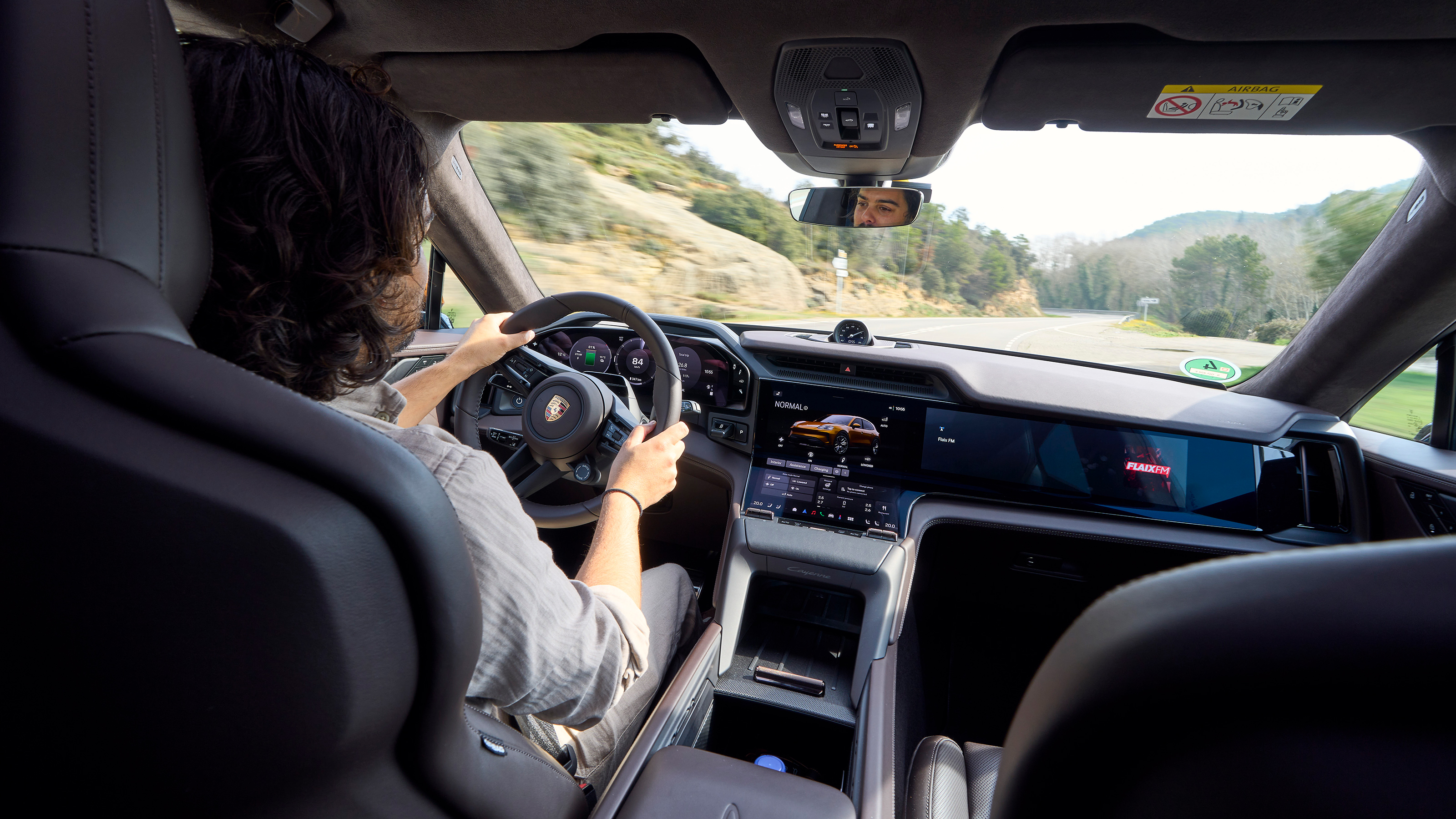 Jordan Katsianis driving the Porsche Cayenne Electric