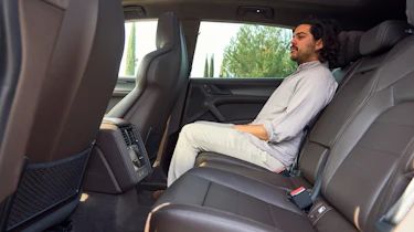Jordan Katsianis sat in the Porsche Cayenne Electric