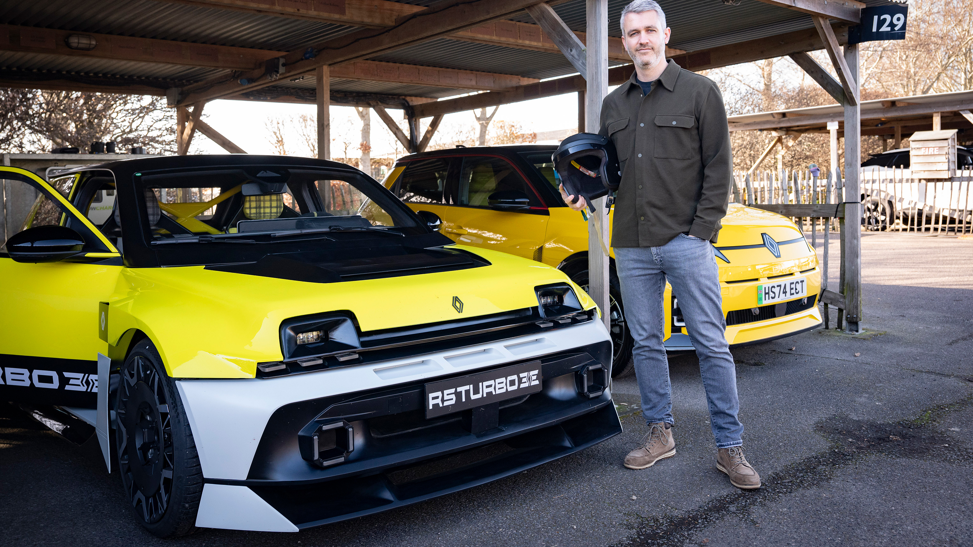 Auto Express deputy editor Richard Ingram standing next to the Renault 5 Turbo 3E