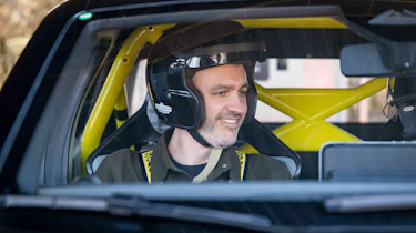 Auto Express deputy editor Richard Ingram sitting inside the Renault 5 Turbo 3E