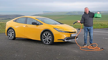 Toyota Prius Excel - header with charging cable