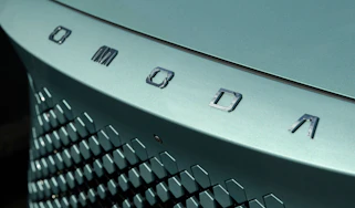 Omoda badge