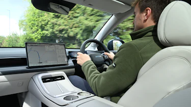 Alastair Crooks driving the Aion V