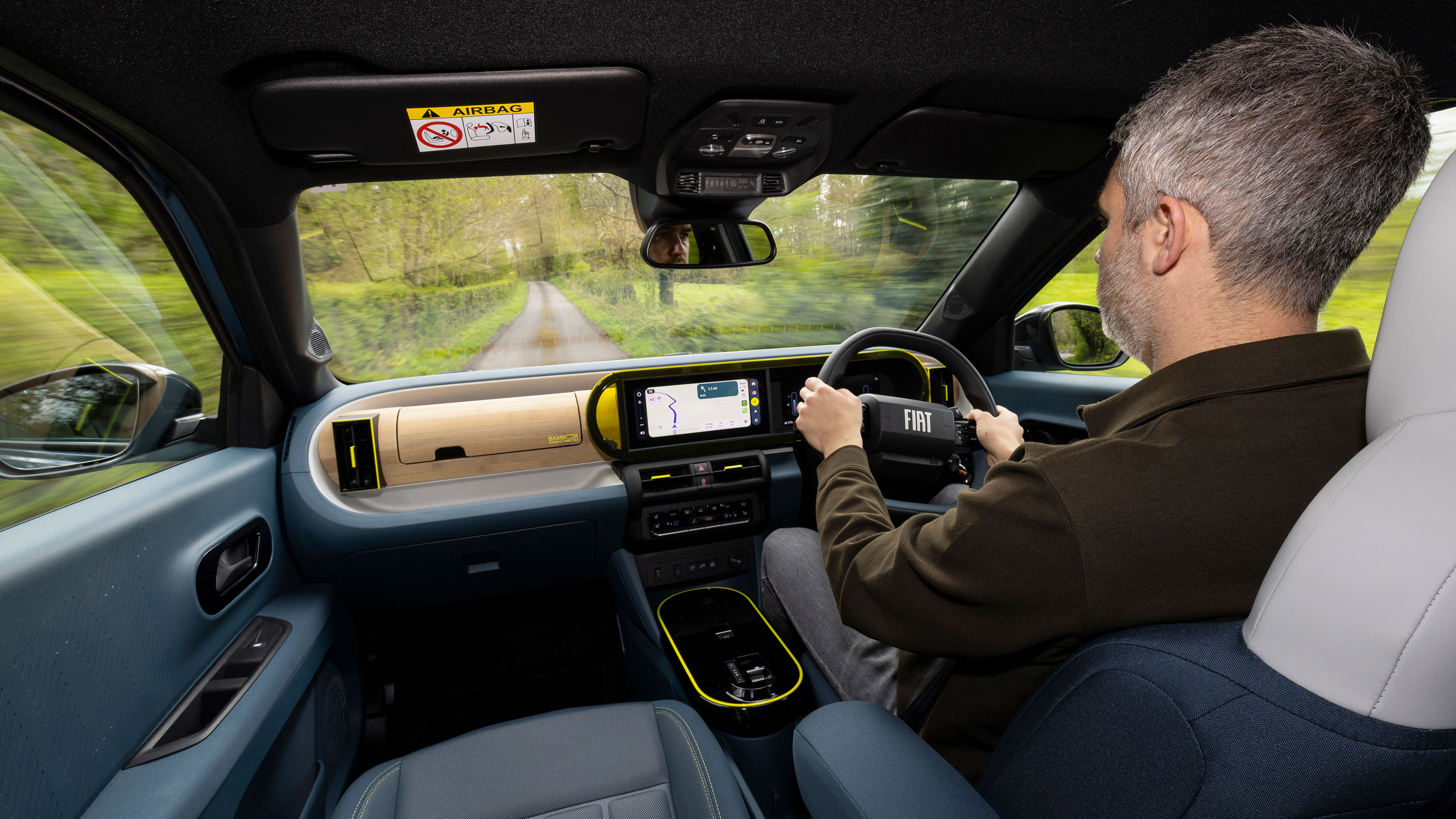 Richard Ingram driving the Fiat Grande Panda Hybrid in the UK