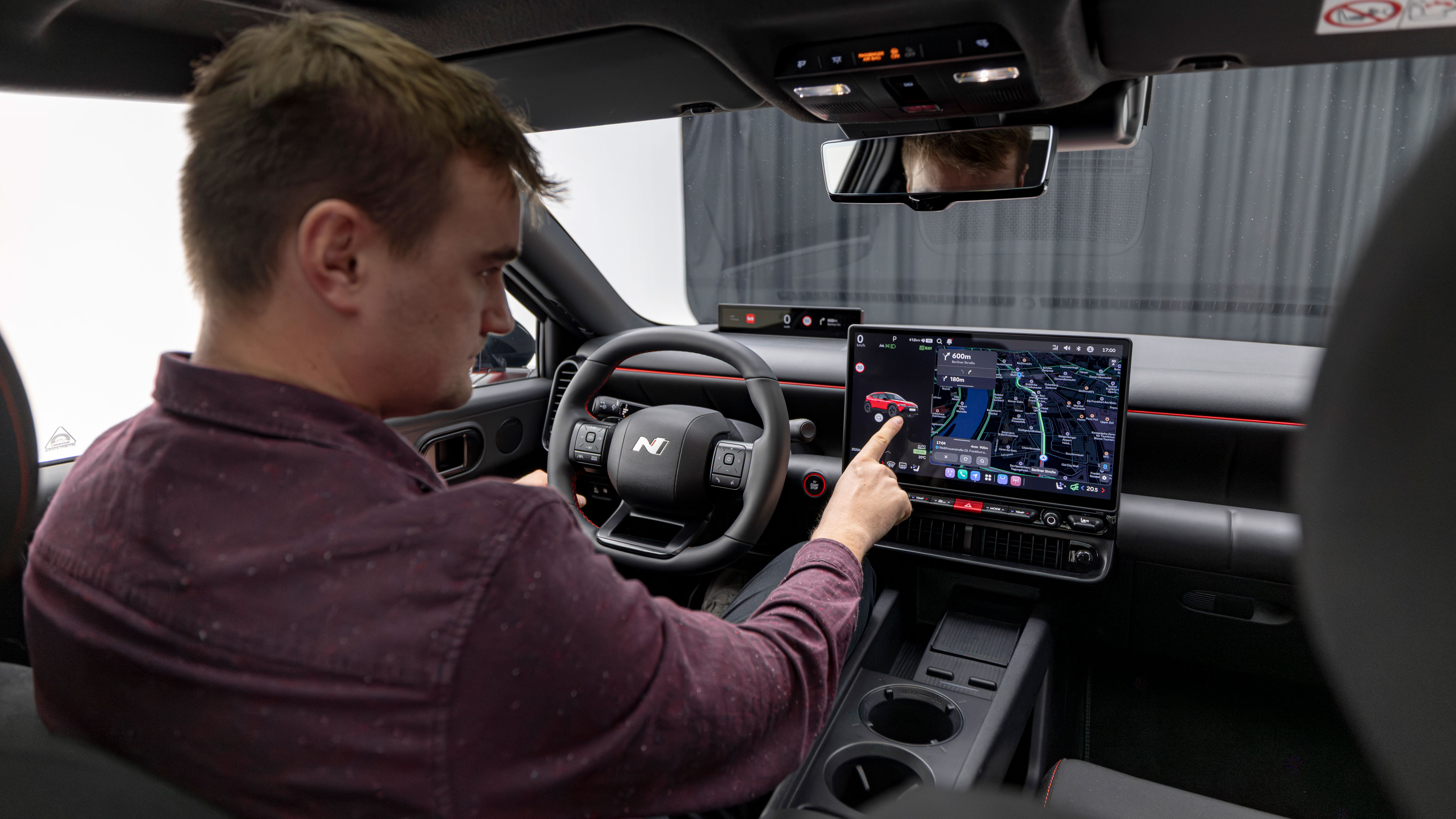 Alastair Crooks sat in the Hyundai Ioniq 3
