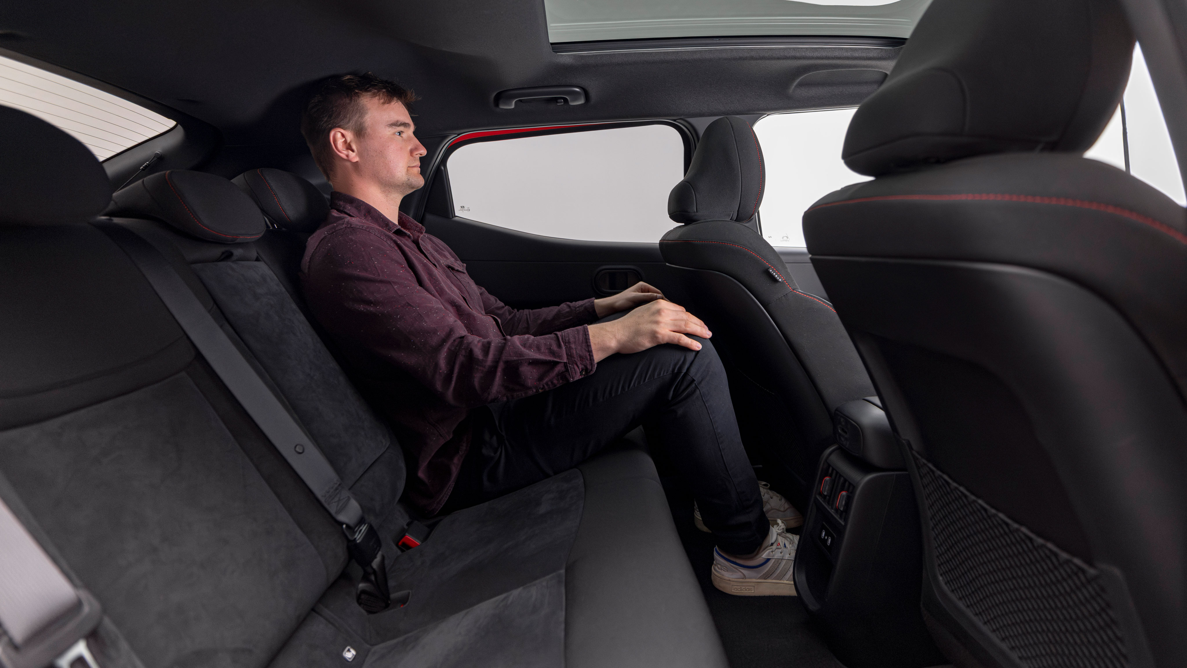 Alastair Crooks sat in the back of the Hyundai Ioniq 3