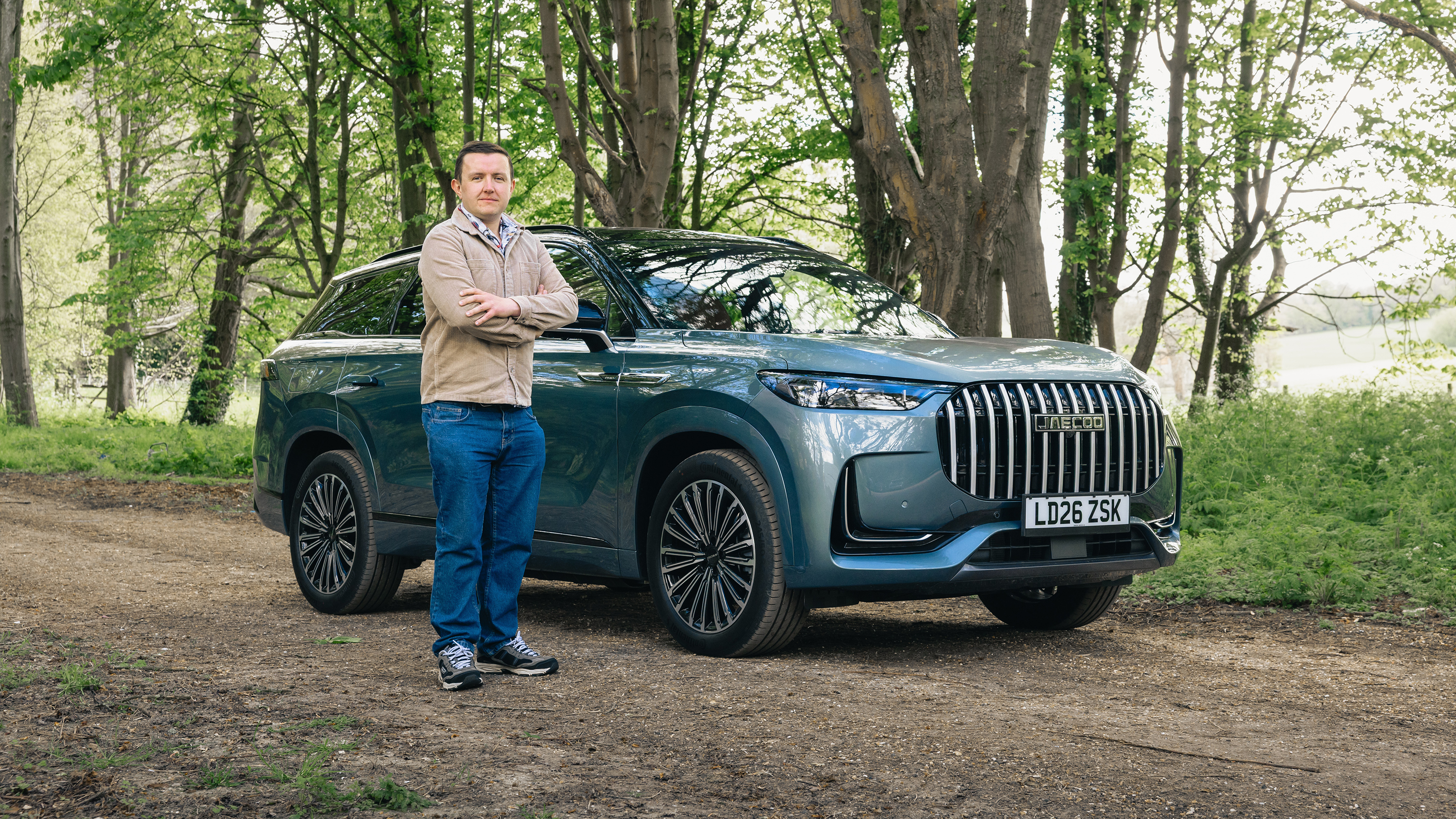 Auto Express senior content editor Shane Wilkinson standing next to the Jaecoo 8