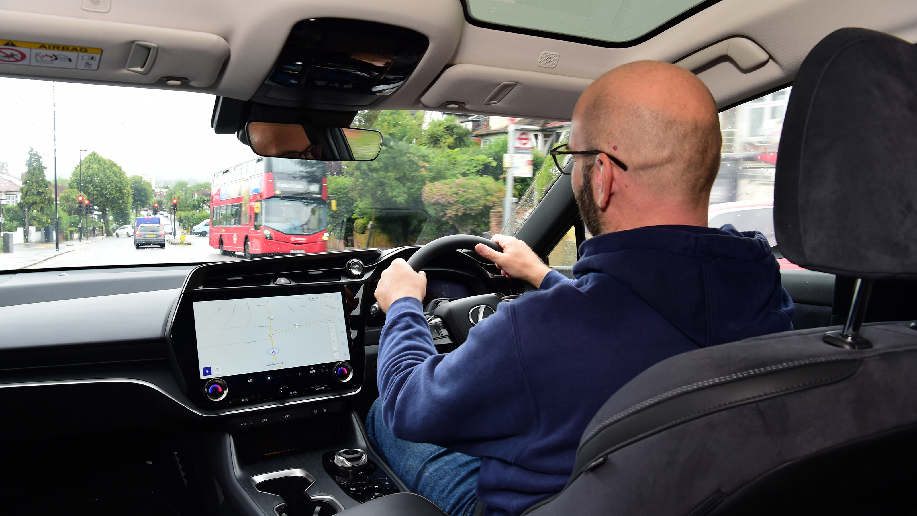 Auto Express creative director Darren Wilson driving the Lexus RZ