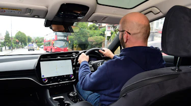 Auto Express creative director Darren Wilson driving the Lexus RZ