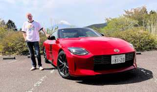 Auto Express editor-at-large Phil McNamara standing next to a Nissan Z