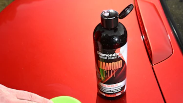 Auto Express Product Awards 2026 - products editor Tom Barnard using Diamondbrite scratch remover