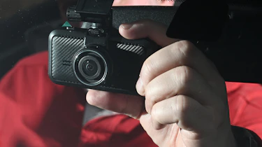 Auto Express Product Awards 2026 - products editor Tom Barnard fitting the Miofive S1 dash cam