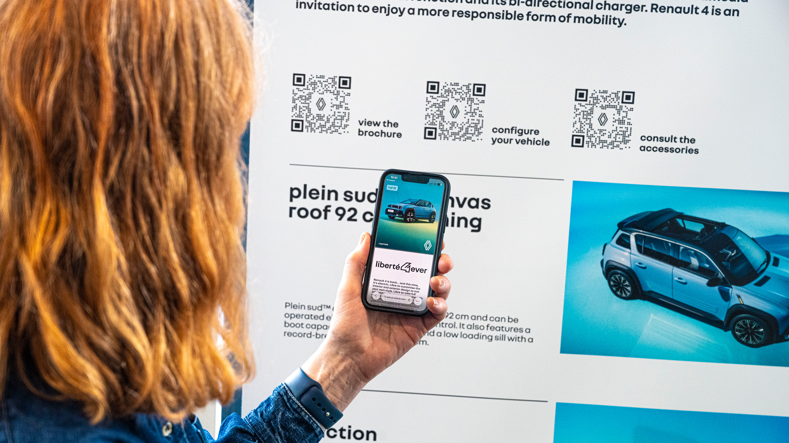 Auto Express pictures editor Dawn Grant scanning a QR code on her phone