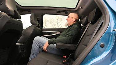 Renault Austral 2026 - rear seats being sat in by Auto Express senior test editor Dean Gibson