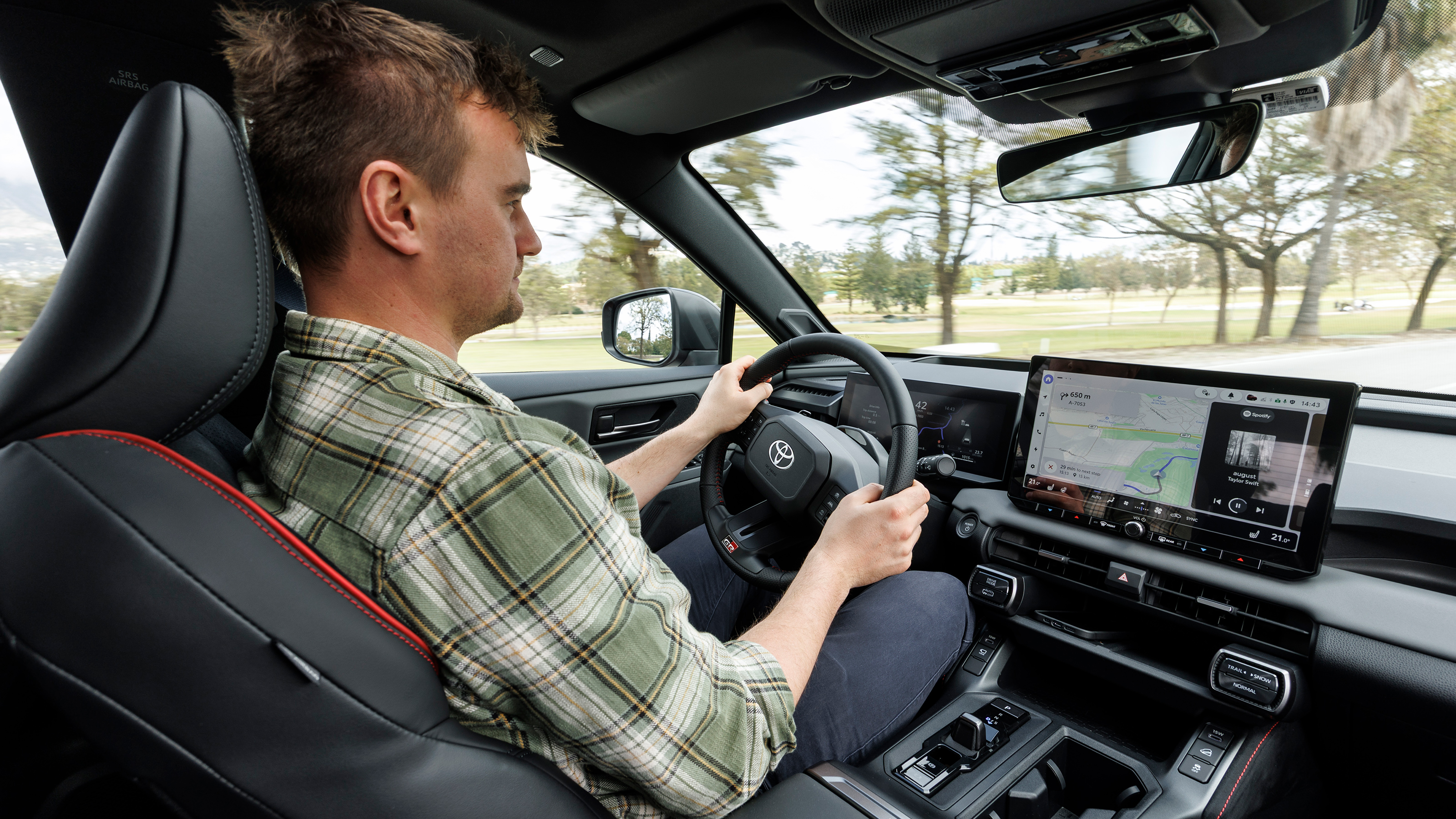 Auto Express senior news reporter Alastair Crooks driving the Toyota RAV4