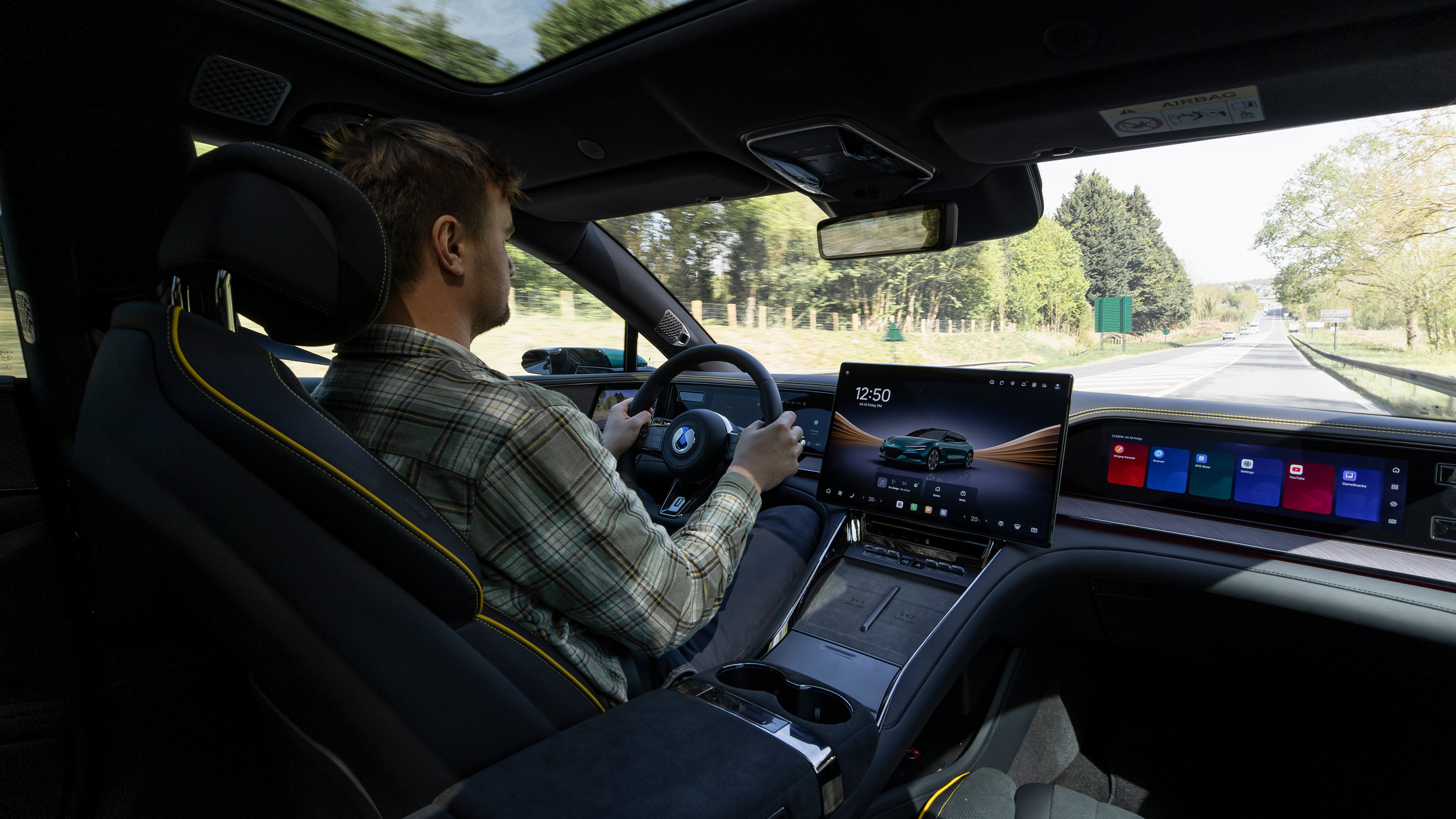 Auto Express senior news reporter Alastair Crooks driving the Denza Z9GT EV