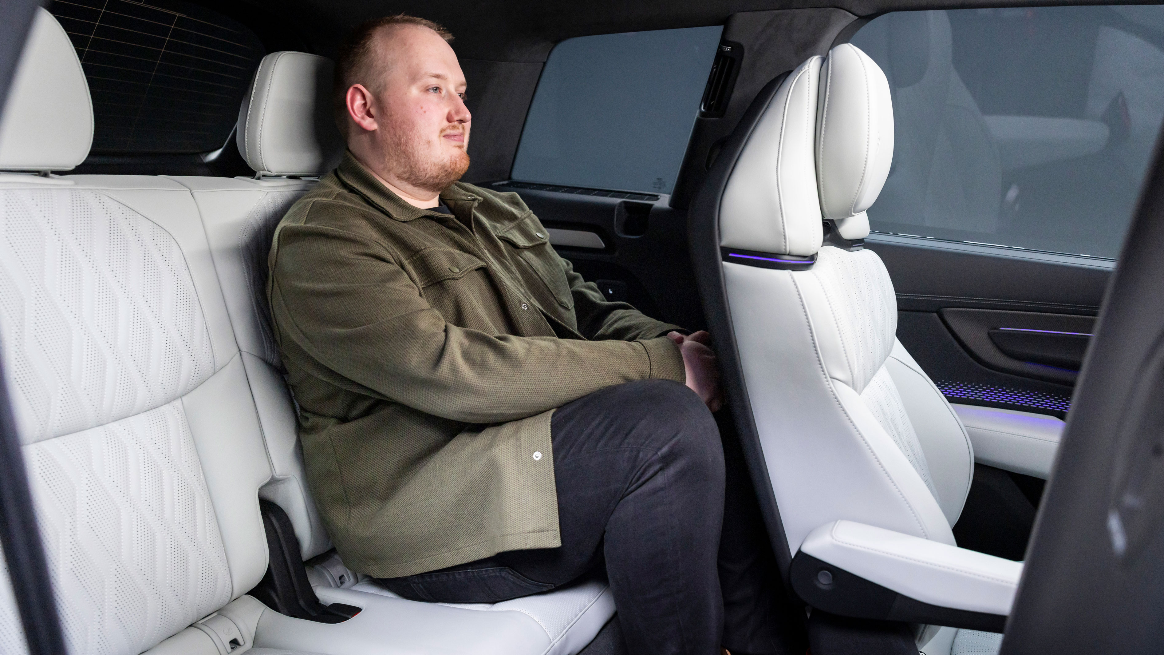 Ellis Hyde sat in the back seats of the Audi Q9