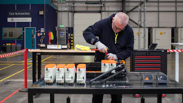 Technician working on EV batteries