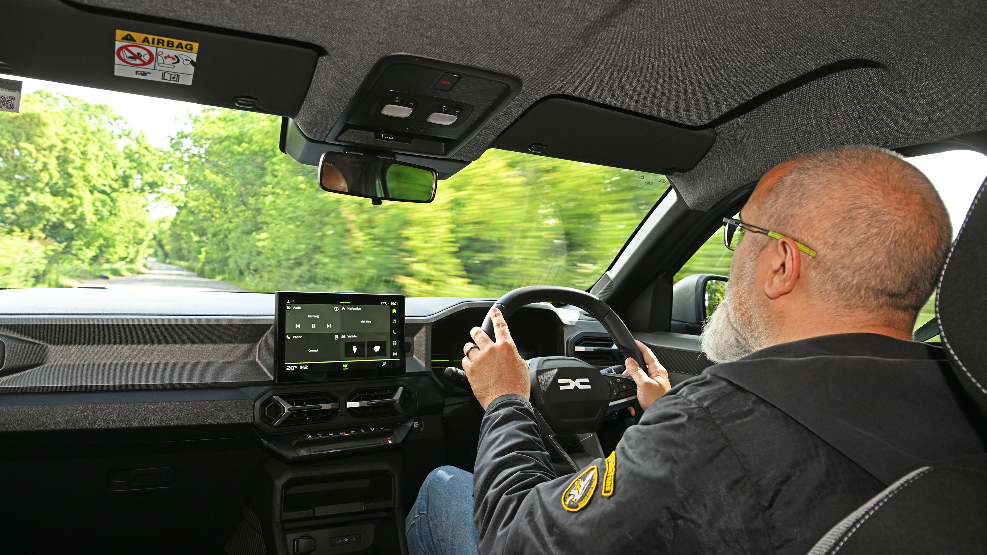 Dacia Duster Hybrid - interior, car being driven by Auto Express senior test editor Dean Gibson