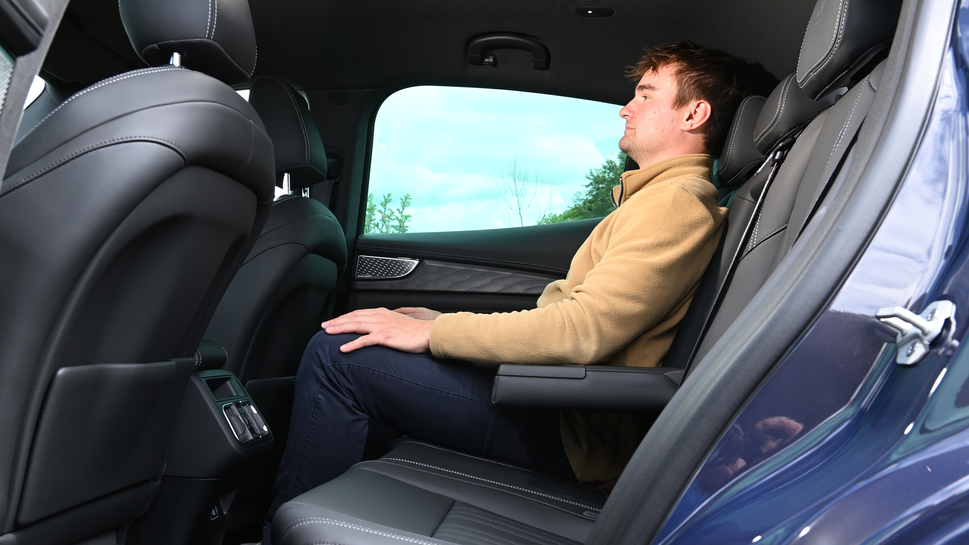 New Maserati Grecale 300 - rear seats being sat in by Auto Express senior news reporter Alastair Crooks 