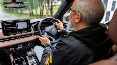 Dean Gibson driving the Mitsubishi Outlander PHEV