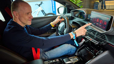 Peugeot E-208 GTi - Phil McNamara in car