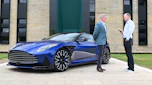 Aston CEO Adrian Hallmark talking to Phil McNamara next to a Vanquish