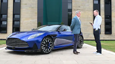 Aston CEO Adrian Hallmark talking to Phil McNamara next to a Vanquish