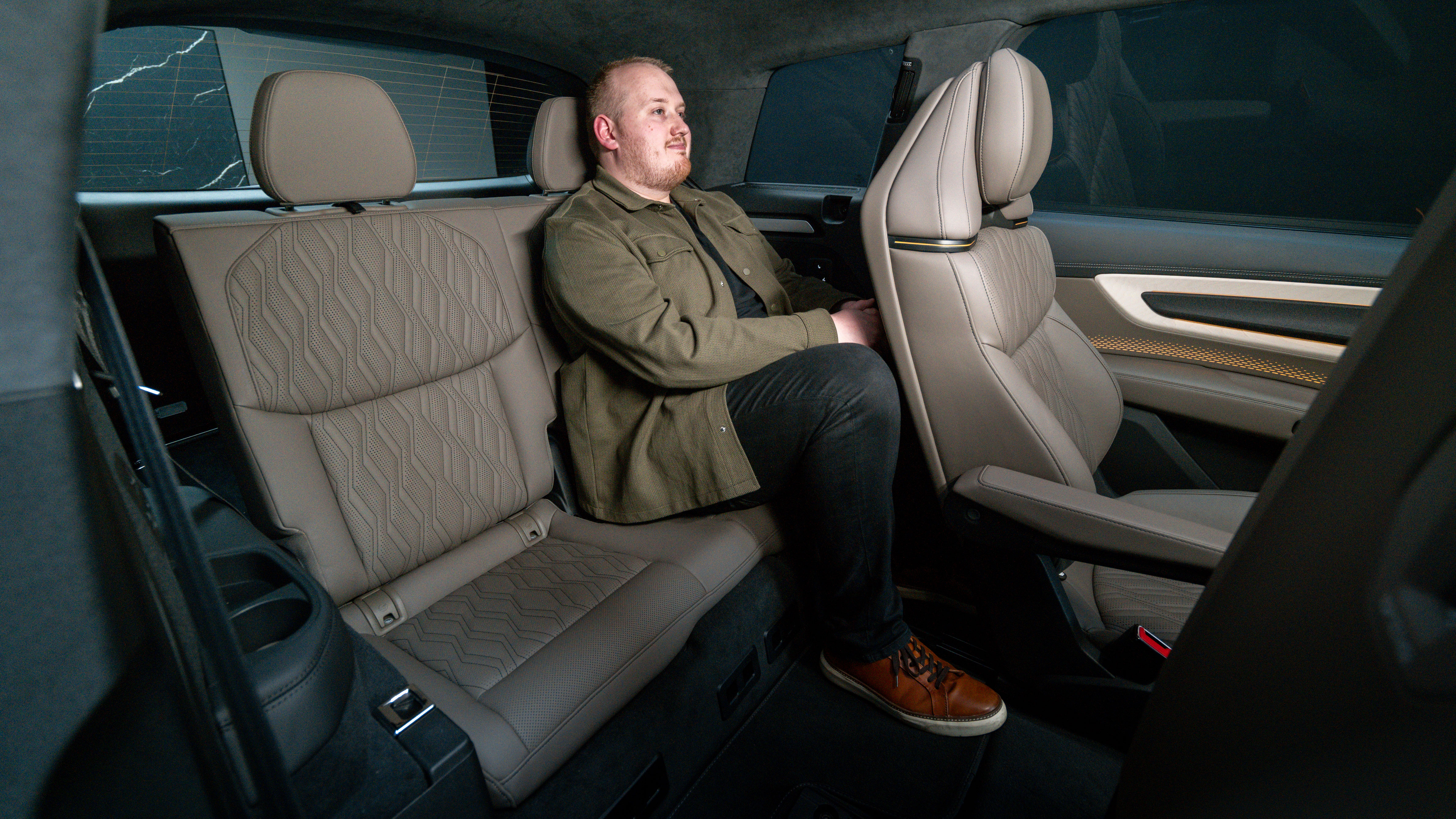 Ellis Hyde sat in the rear of the Audi Q9