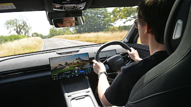 Auto Express consumer editor Tom Jervis driving the Omoda 7 SHS-P Noble Tech