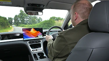 New Geely EX2 - interior, car being driven by Auto Express news reporter Ellis Hyde