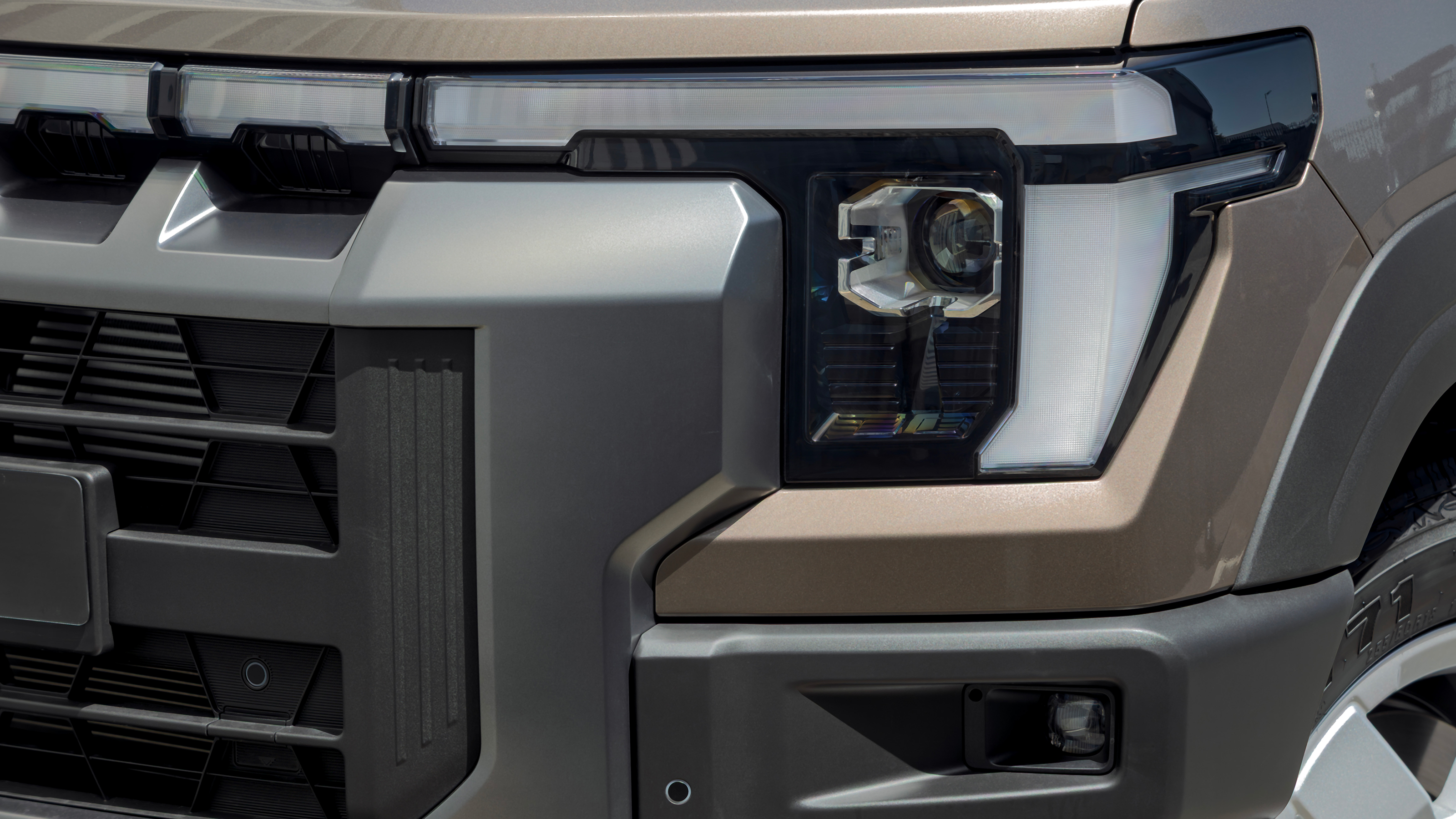 KGM Musso Rhino - front light
