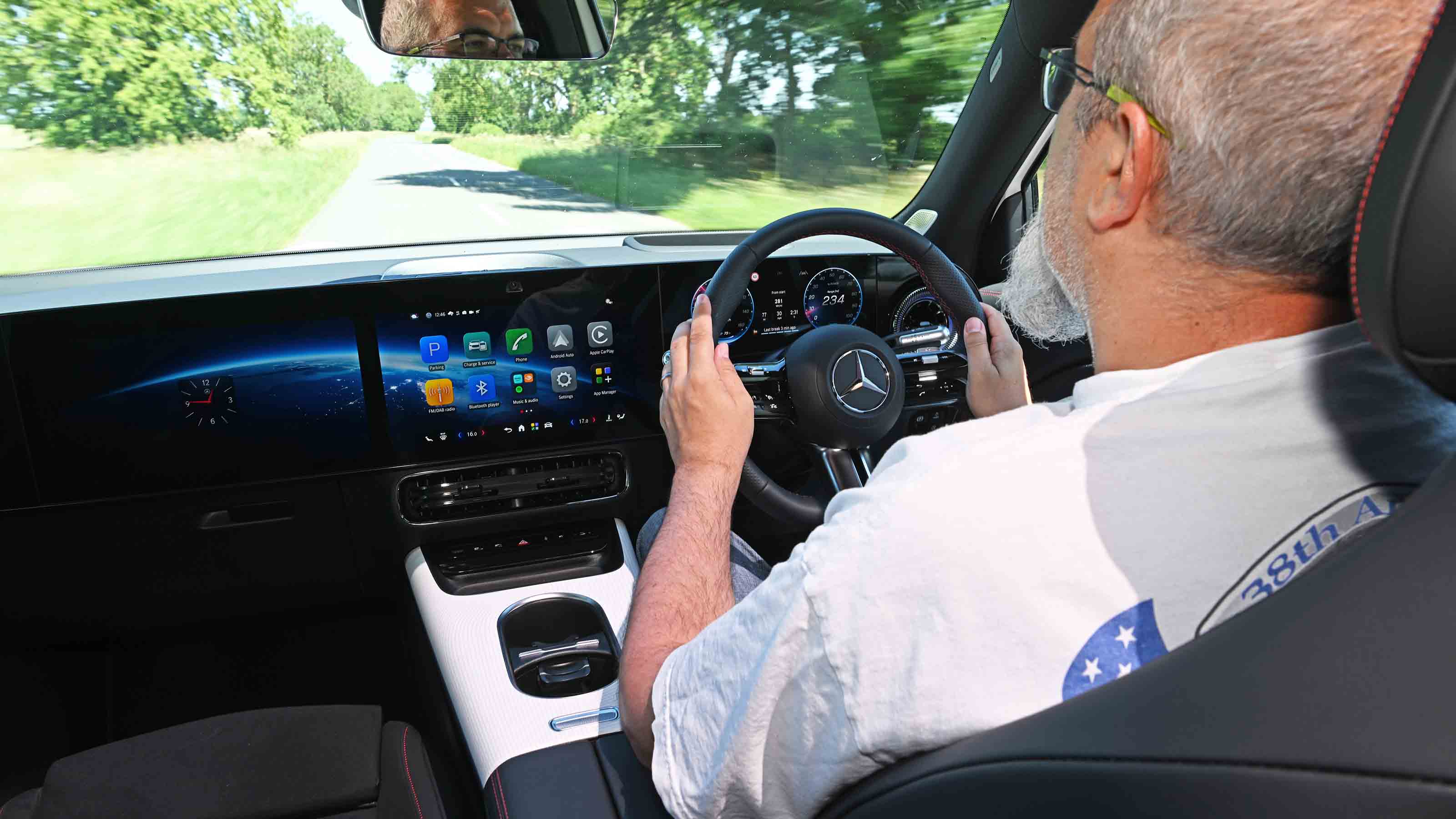 Mercedes GLB electric - interior driving shot with senior test editor, Dean Gibson