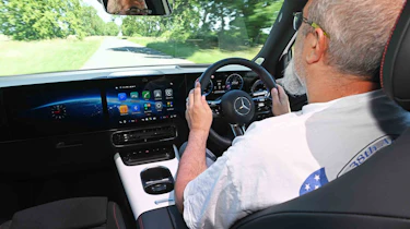 Mercedes GLB electric - interior driving shot with senior test editor, Dean Gibson