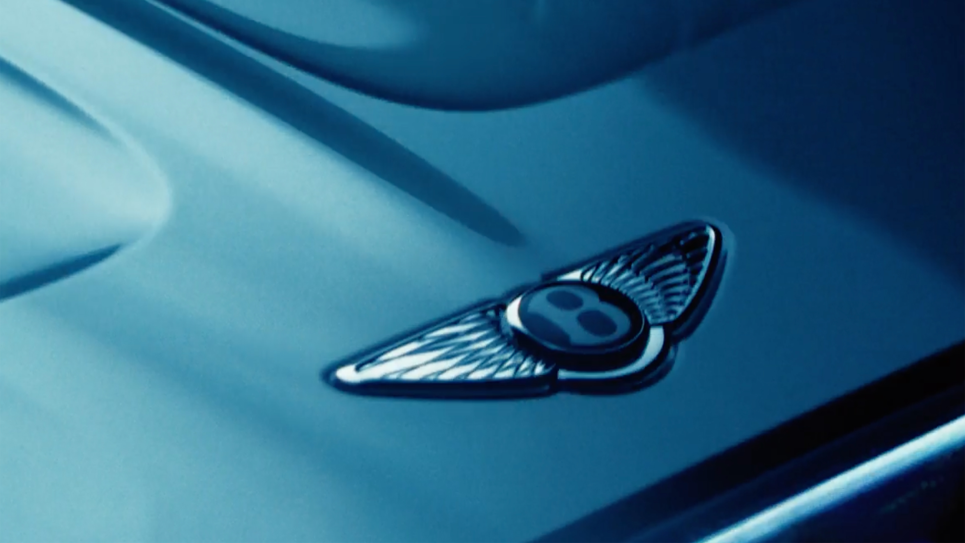 New Bentley Torcal teasers - bonnet emblem 