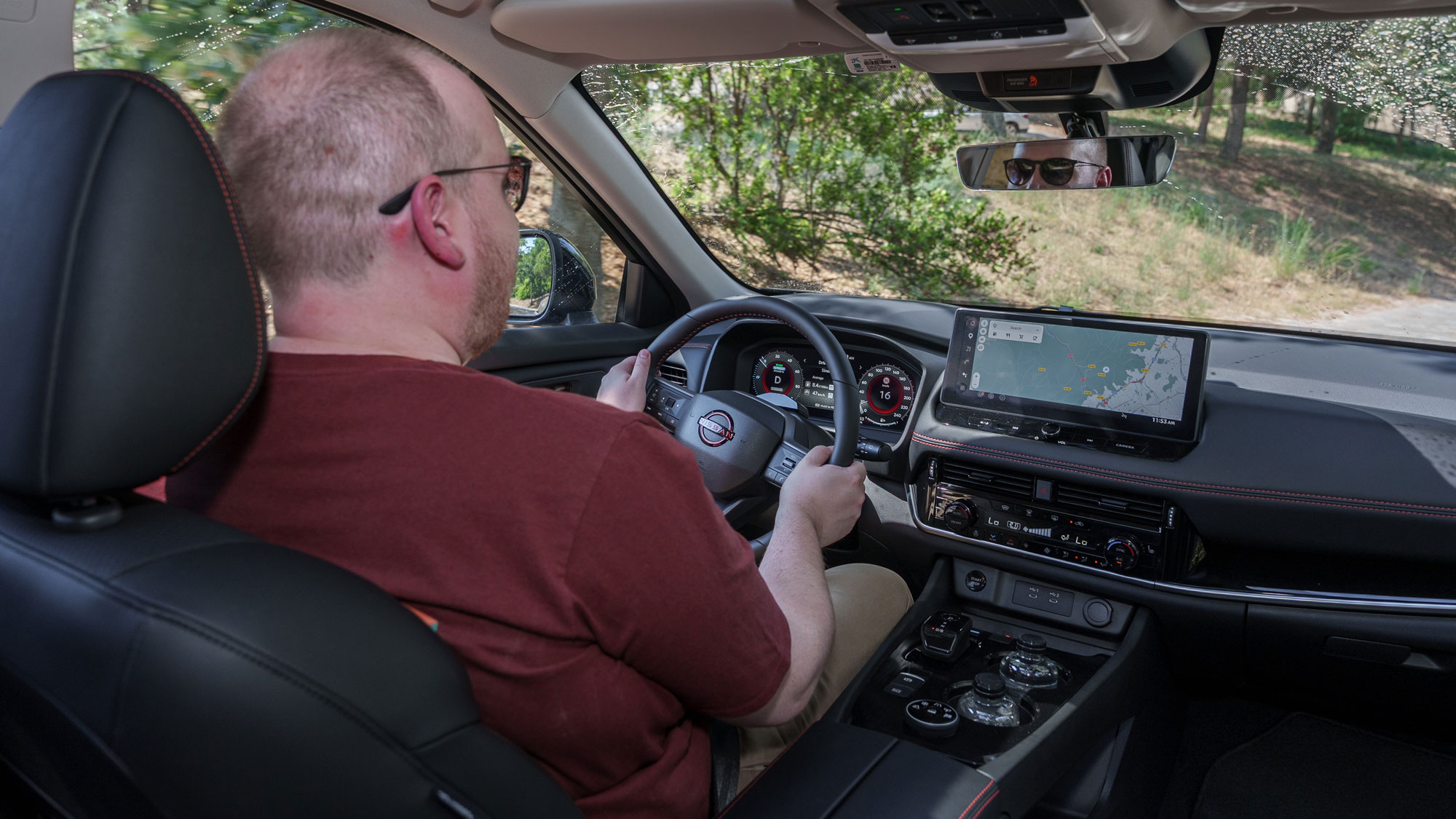 Auto Express news reporter Ellis Hyde driving the Nissan X-Trail