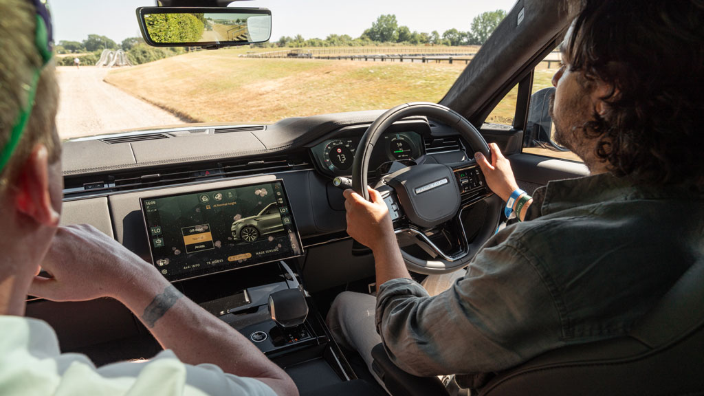 Jordan Katsianis driving the Range Rover Sport EV prototype