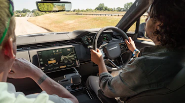 Jordan Katsianis driving the Range Rover Sport EV prototype