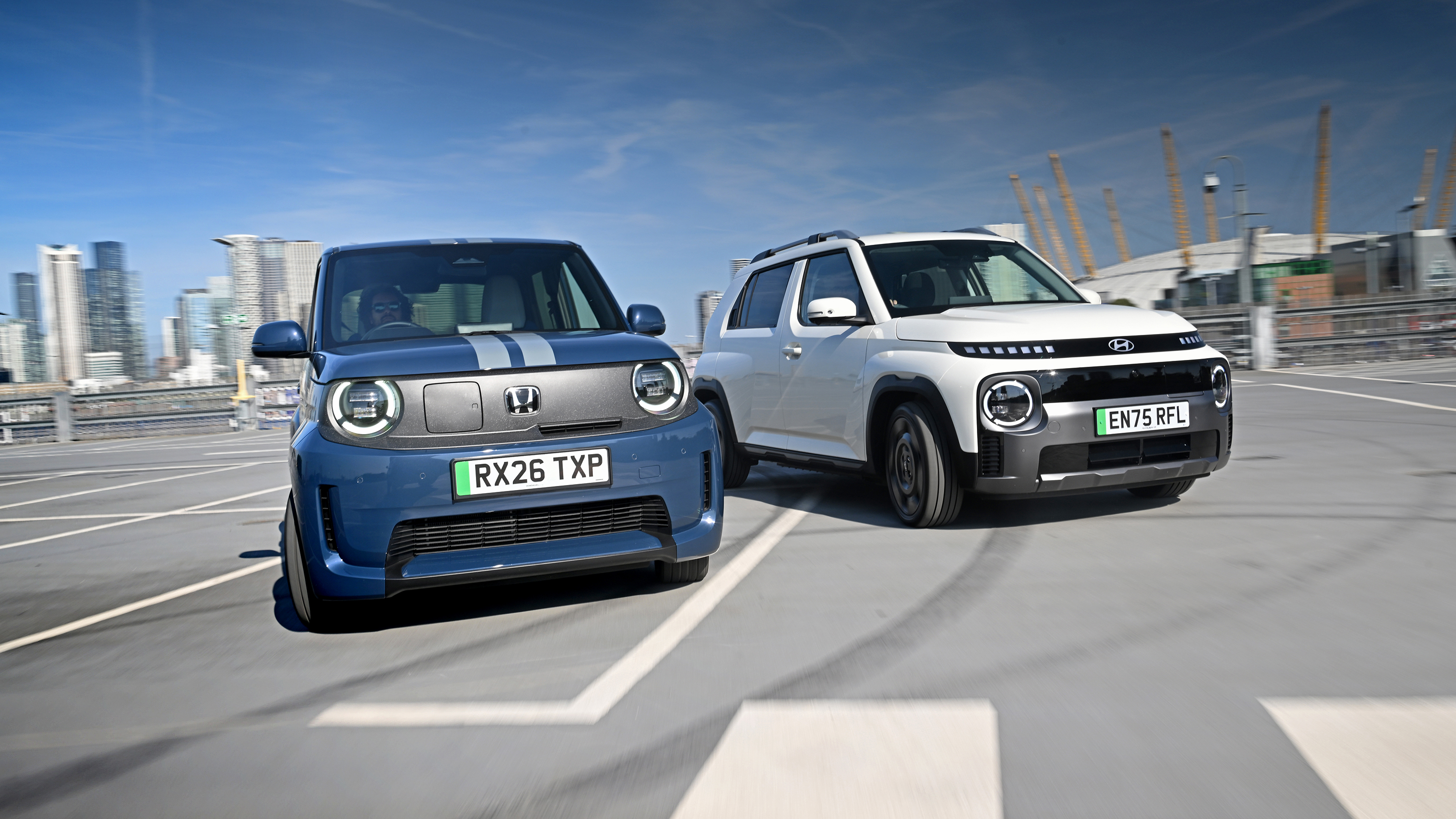 Hyundai Inster vs Honda Super-N - front cornering