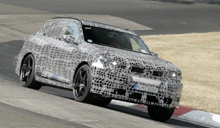 New BMW iX5 M at the Nurburgring - front cornering