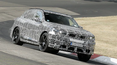New BMW iX5 M at the Nurburgring - front cornering