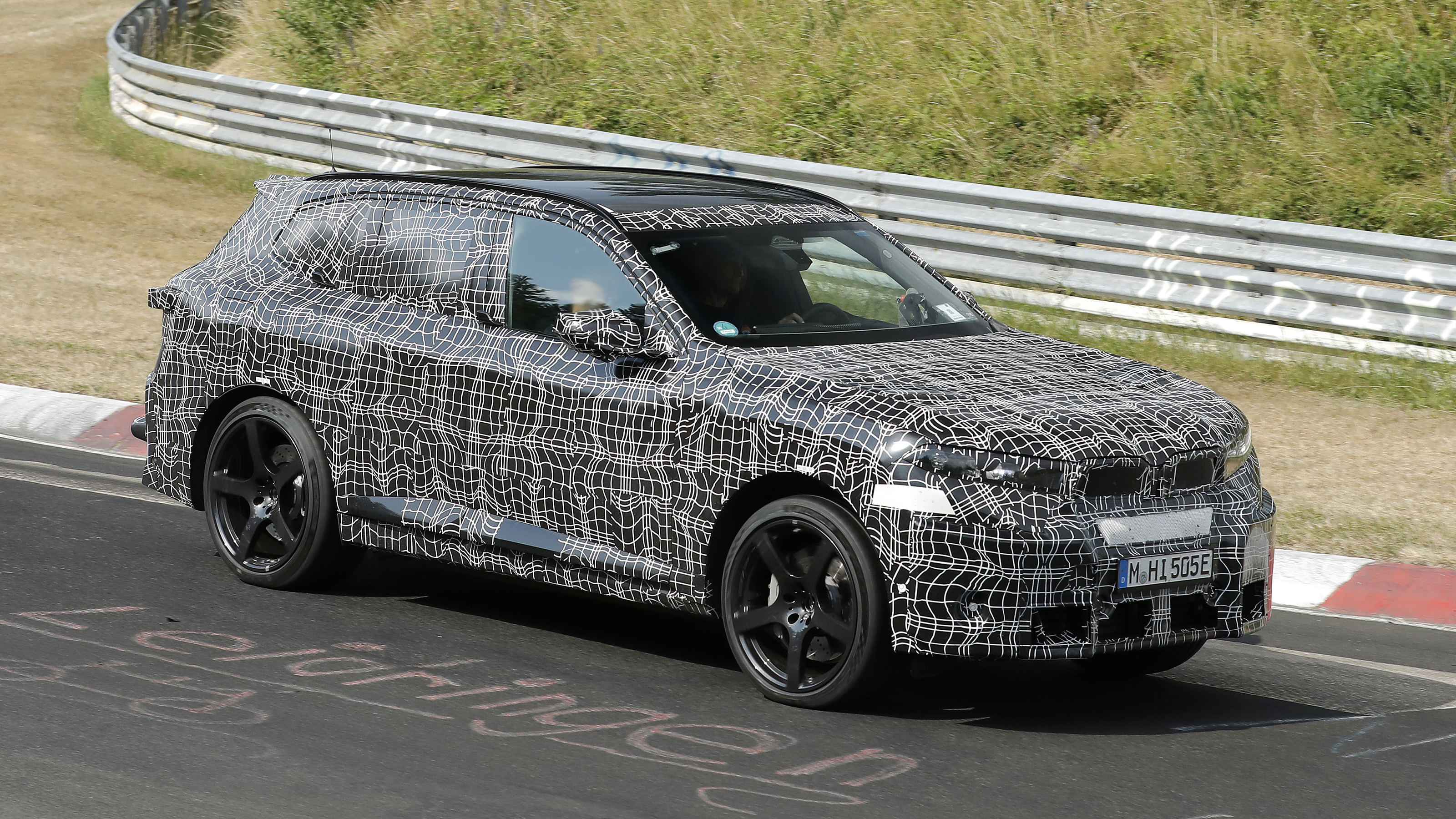 New BMW iX5 M at the Nurburgring - front action