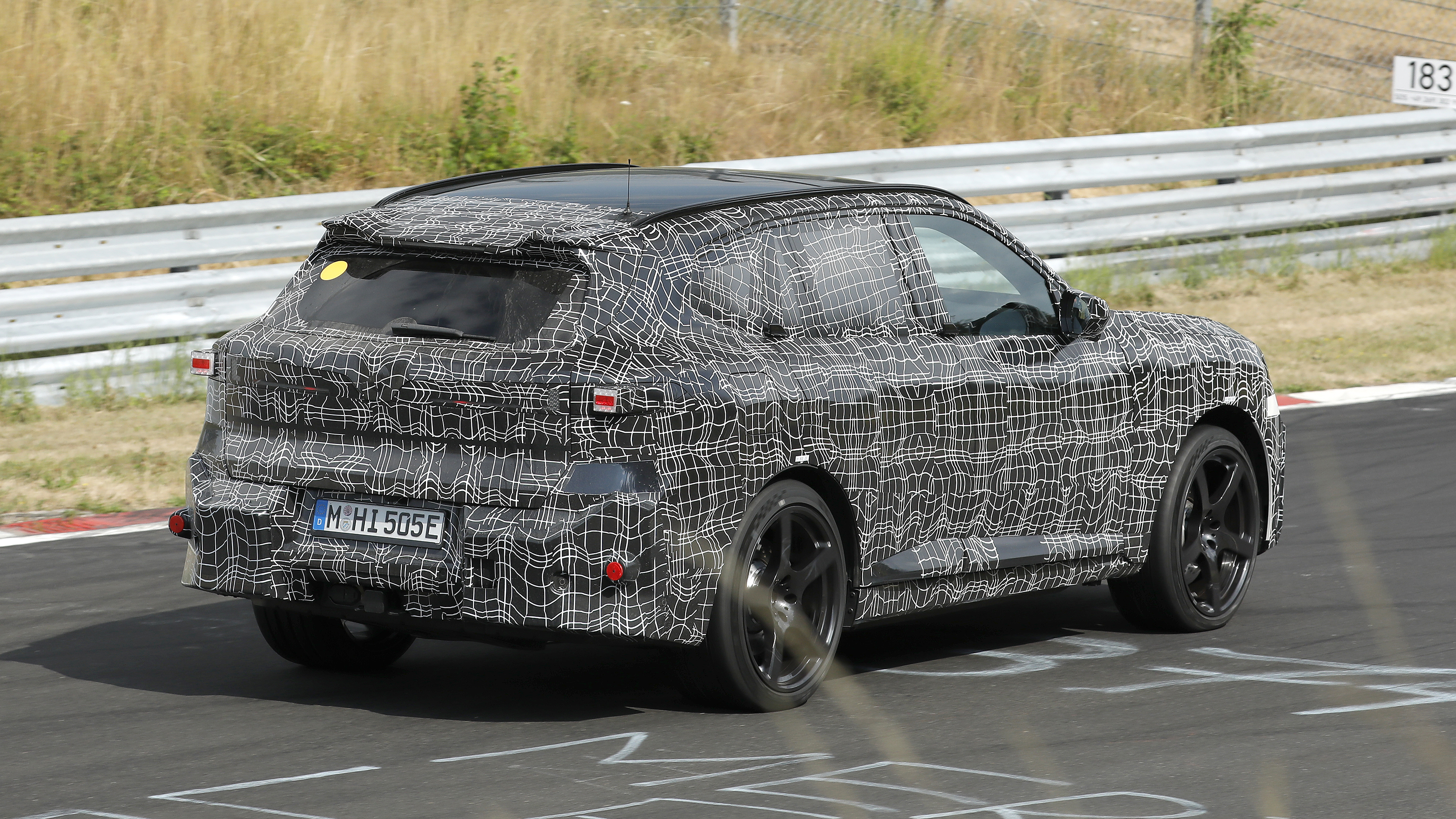 New BMW iX5 M at the Nurburgring - rear cornering 