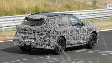 New BMW iX5 M at the Nurburgring - rear cornering